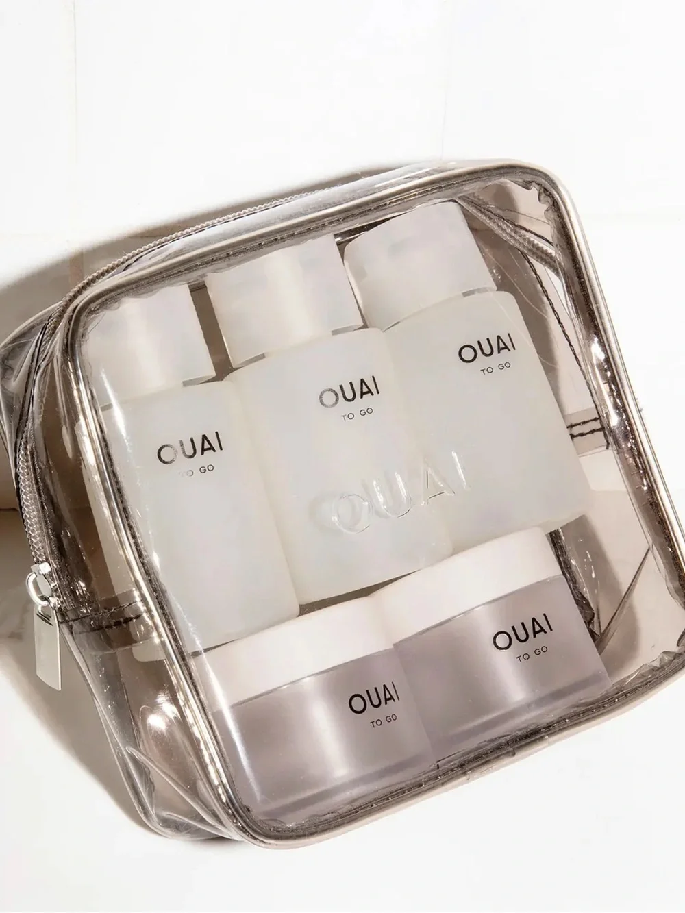 OUAI TO GO REFILLABLE TRAVEL BOTTLE KIT (empty)